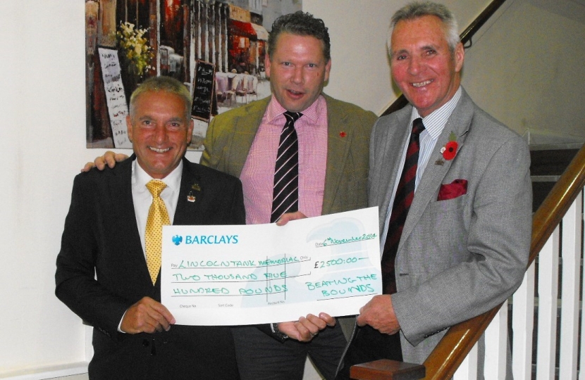 Presenting a cheque to Lincoln Tank Memorial