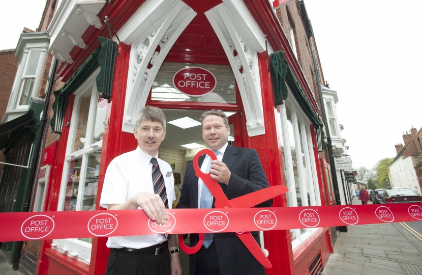 Karl cutting the ribbon at the new-look Bailgate Post Office